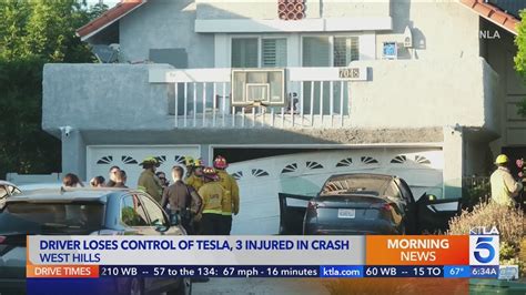 3 injured after Tesla driver loses control, smashes into garage in San Fernando Valley